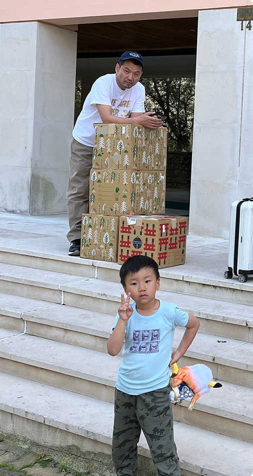 Photo of Asian Migrants moving in to a new home